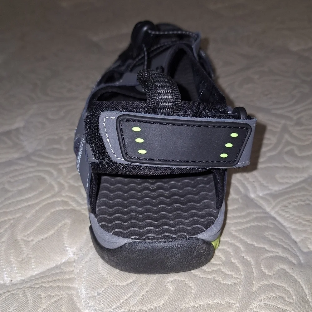A pair of Coleman George sandals in a men's size 13M. They're in excellent shape
